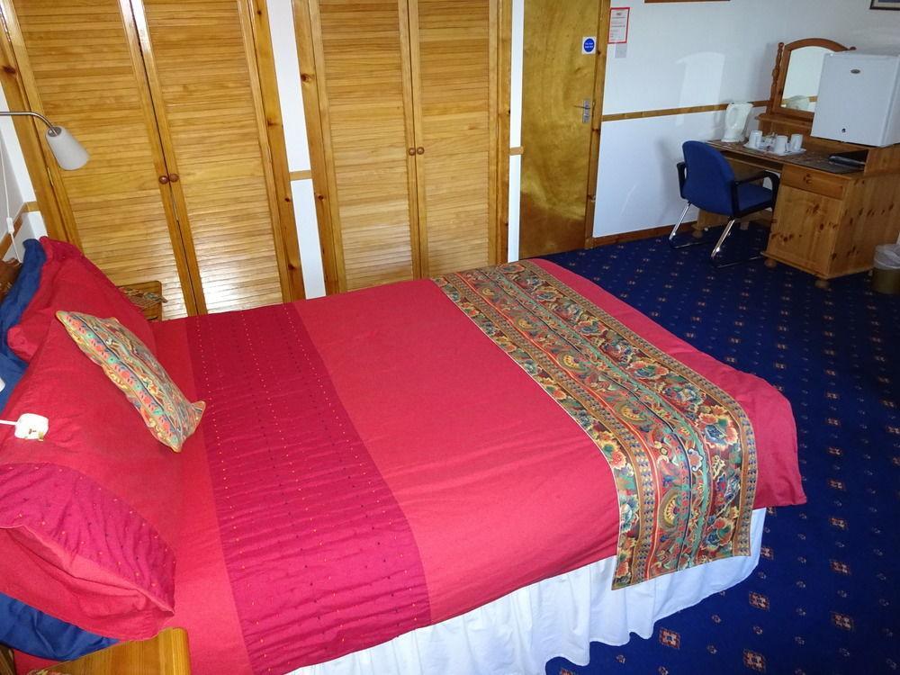 Houton Bay Lodge Orphir  ภายนอก รูปภาพ